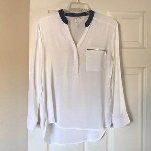White rayon long sleeve blouse.